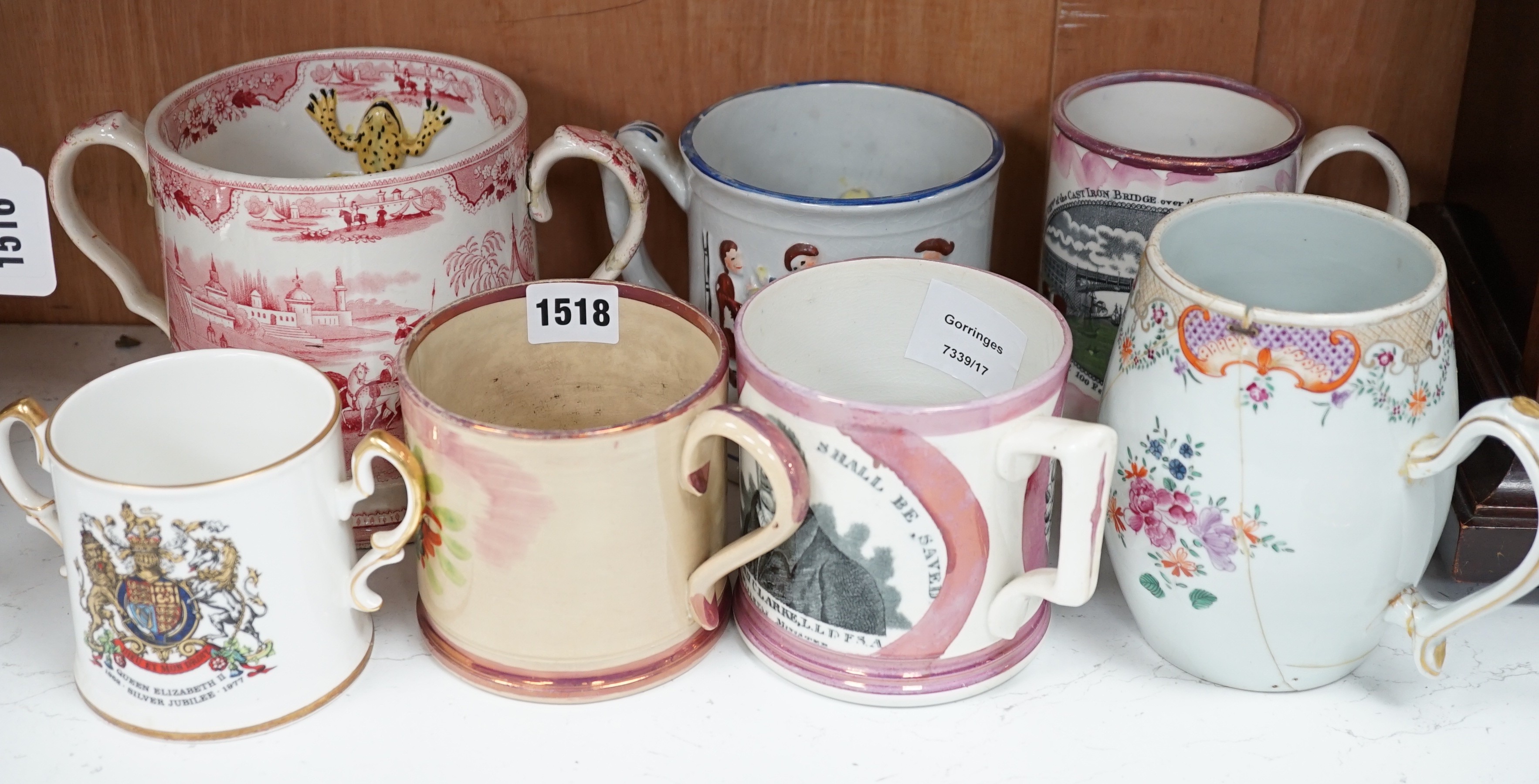 Three Sunderland pink lustre mugs, two Staffordshire pottery 'frog' mugs and two others (7)